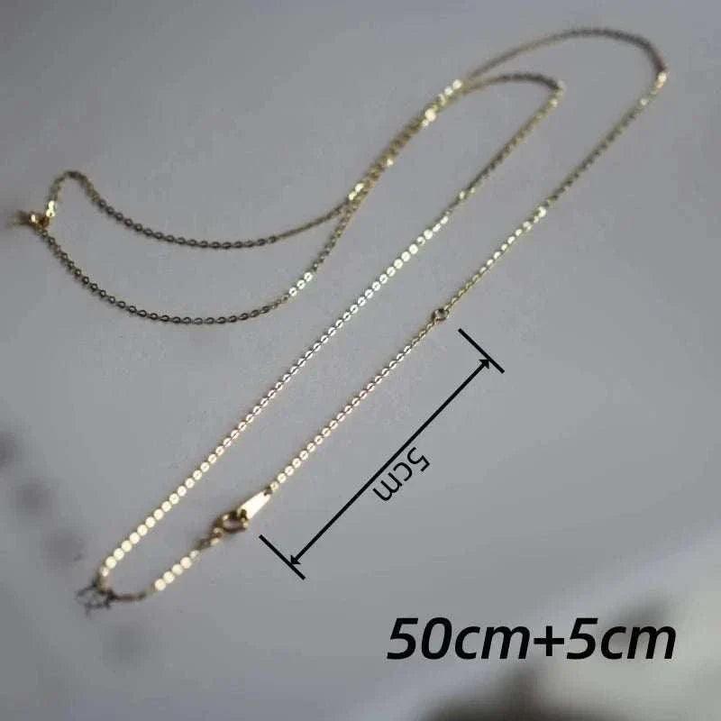 14K solid gold minimalist necklace with a timeless design, 50cm length.