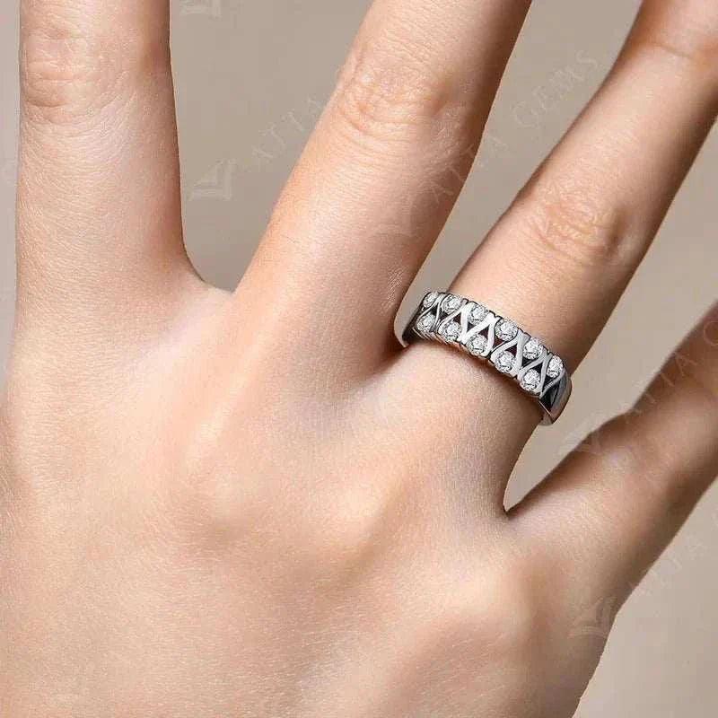 0.66ct Moissanite solitaire ring on a hand, showcasing a sparkling moissanite gemstone in a premium band.