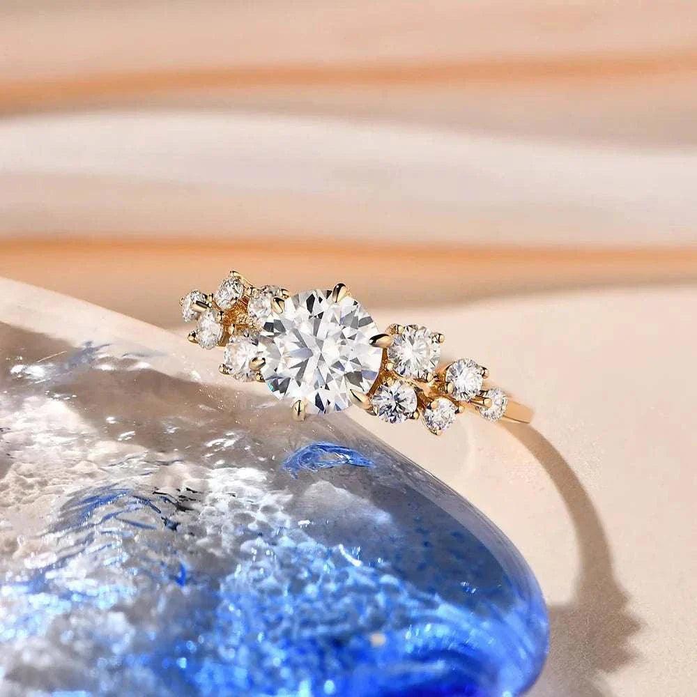 Artisan moissanite gold ring with dazzling gemstone on a solid gold setting.