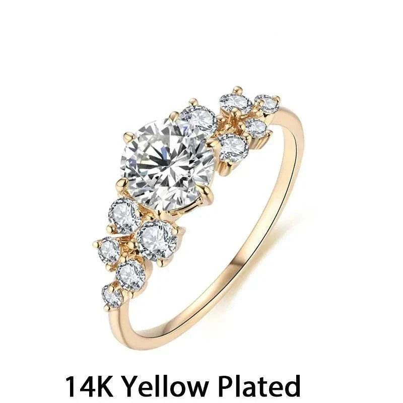 Artisan moissanite gold ring with 14K yellow gold plating and dazzling gemstone.