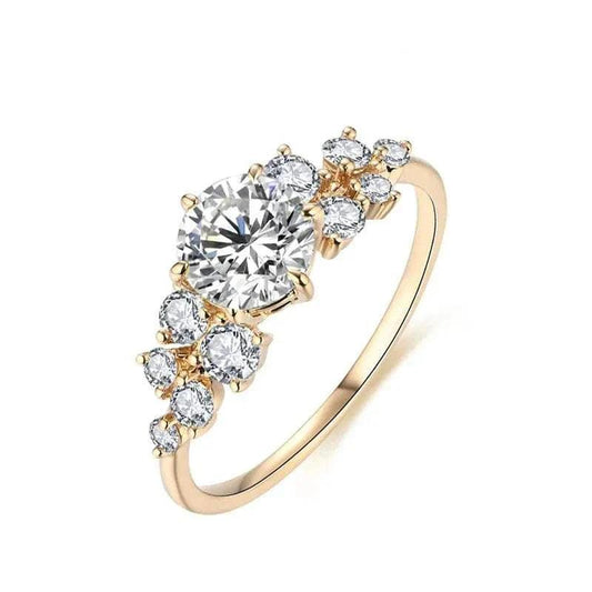 Artisan Moissanite Gold Ring with sparkling gemstone and gold band, sustainable and elegant design.