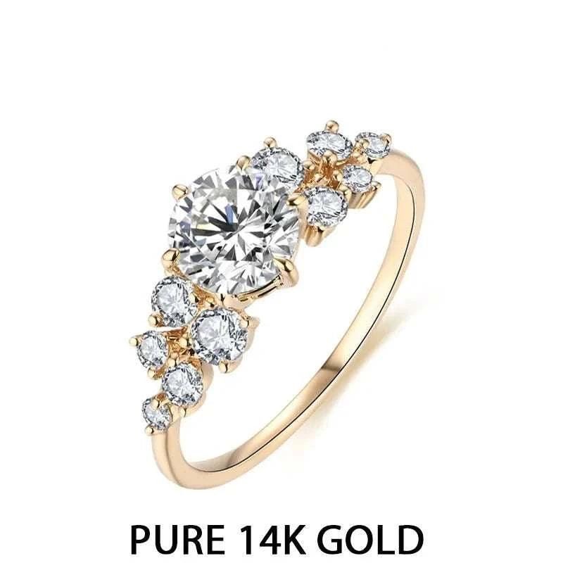 Artisan Moissanite Gold Ring in 14K gold with dazzling gemstones.