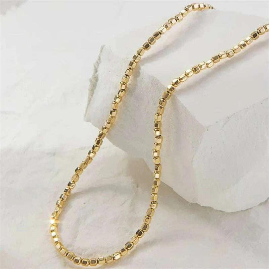 14K Gold Filled Dainty Bead Choker Necklace with lustrous 4MM gold-filled beads, tarnish-resistant and hypoallergenic, ideal for any occasion.