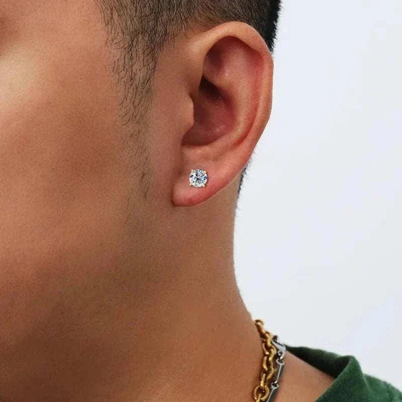 14k gold moissanite stud earrings worn by a person.