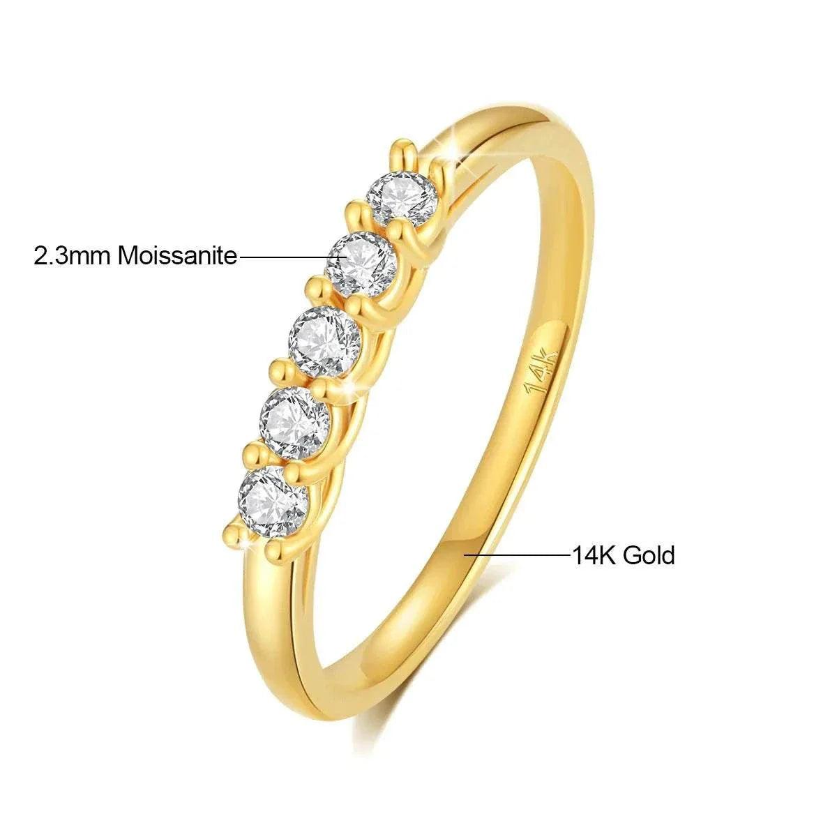 14k gold moissanite luxury wedding band for women with sparkling stones.