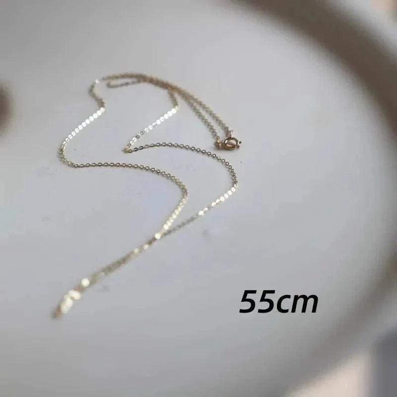 14K solid gold minimalist necklace with 55cm length showcasing timeless elegance.