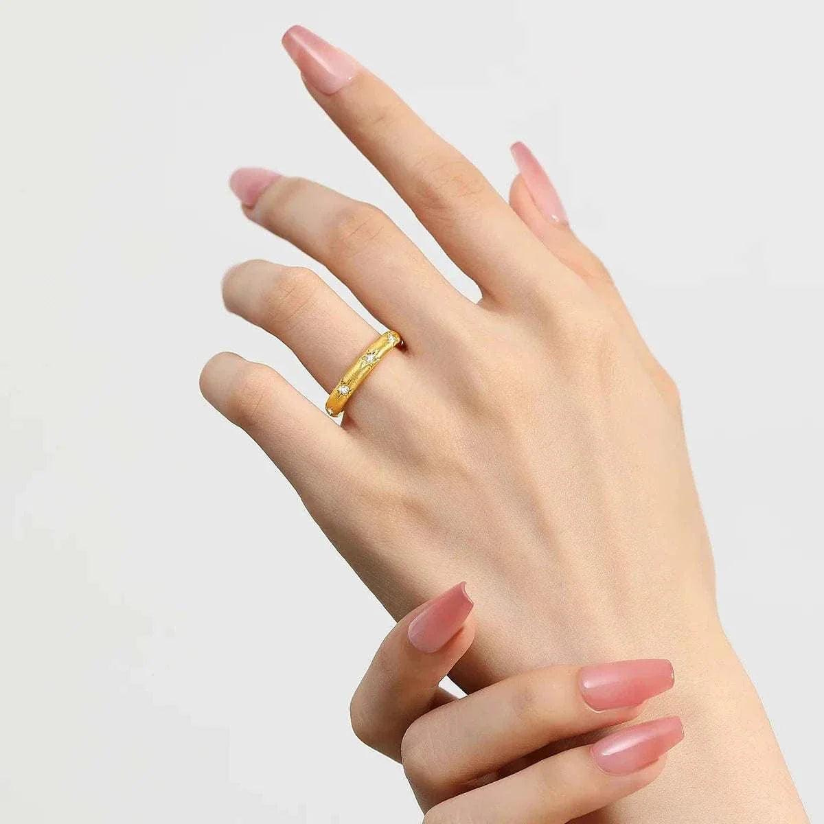 18K gold moissanite luxury diamond ring on hand, showcasing elegant design and craftsmanship.