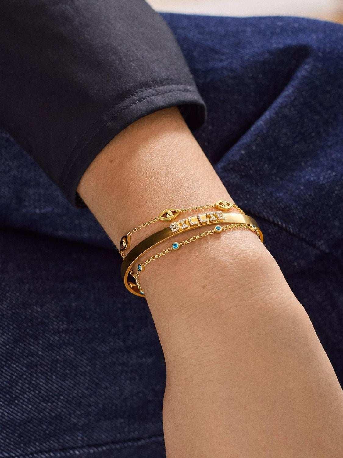 18K Gold-Plated Titanium Steel Bracelet


The 18K Gold-Plated Titanium Steel Bracelet is a stunning fusion of elegance, durability, and timeless charm. Carefully cra