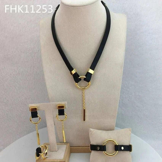 4PC elegant jewelry set for women with necklace, bracelet, earrings, and ring in gold-plated zinc alloy.