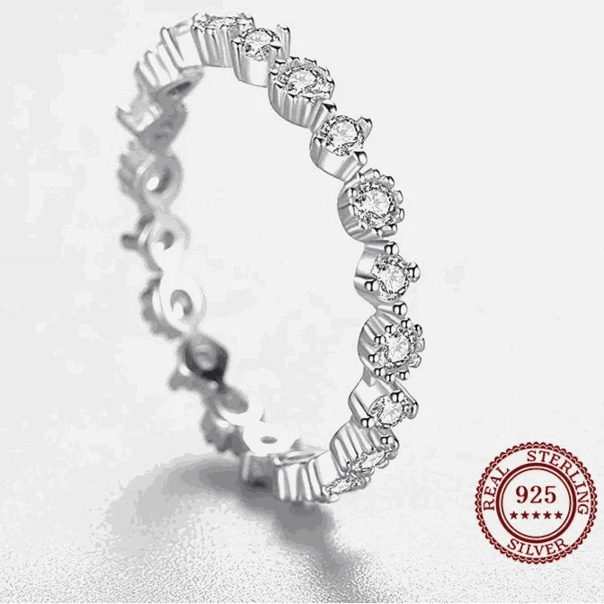 This elegant Simple Stackable Eternity Band Ring is crafted with high-quality materials, ensuring long-lasting durability. The minimalist design allows it to be easi