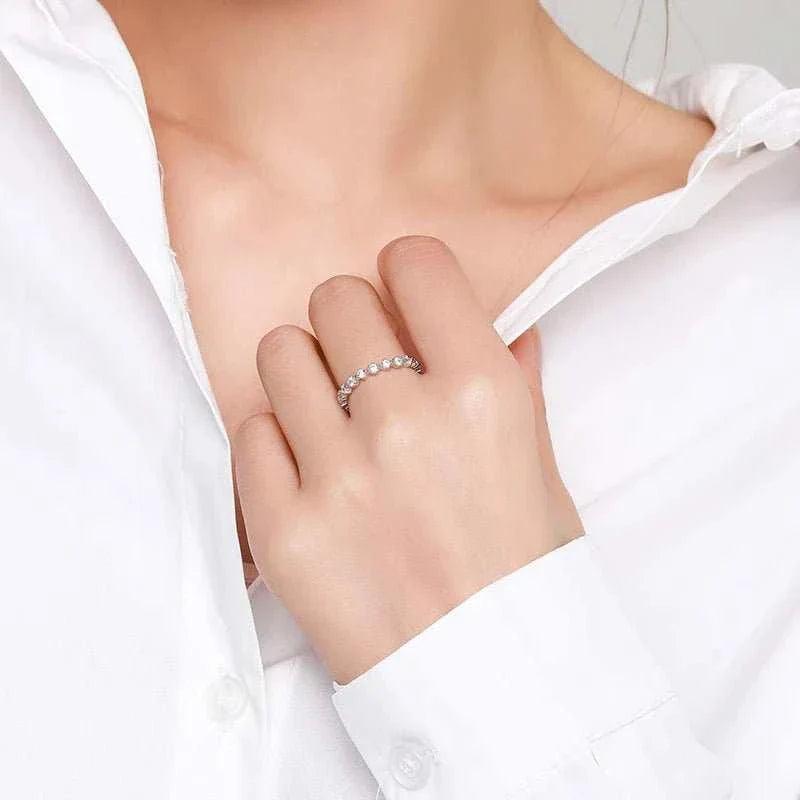 This elegant Simple Stackable Eternity Band Ring is crafted with high-quality materials, ensuring long-lasting durability. The minimalist design allows it to be easi