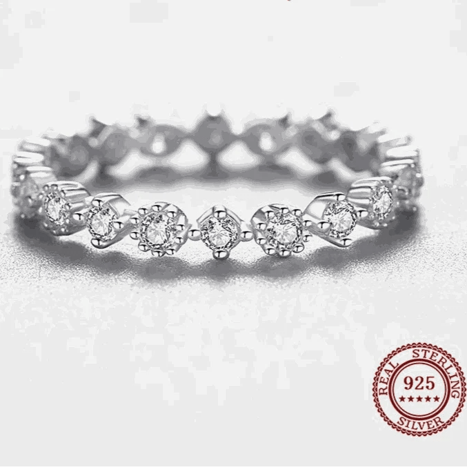 This elegant Simple Stackable Eternity Band Ring is crafted with high-quality materials, ensuring long-lasting durability. The minimalist design allows it to be easi