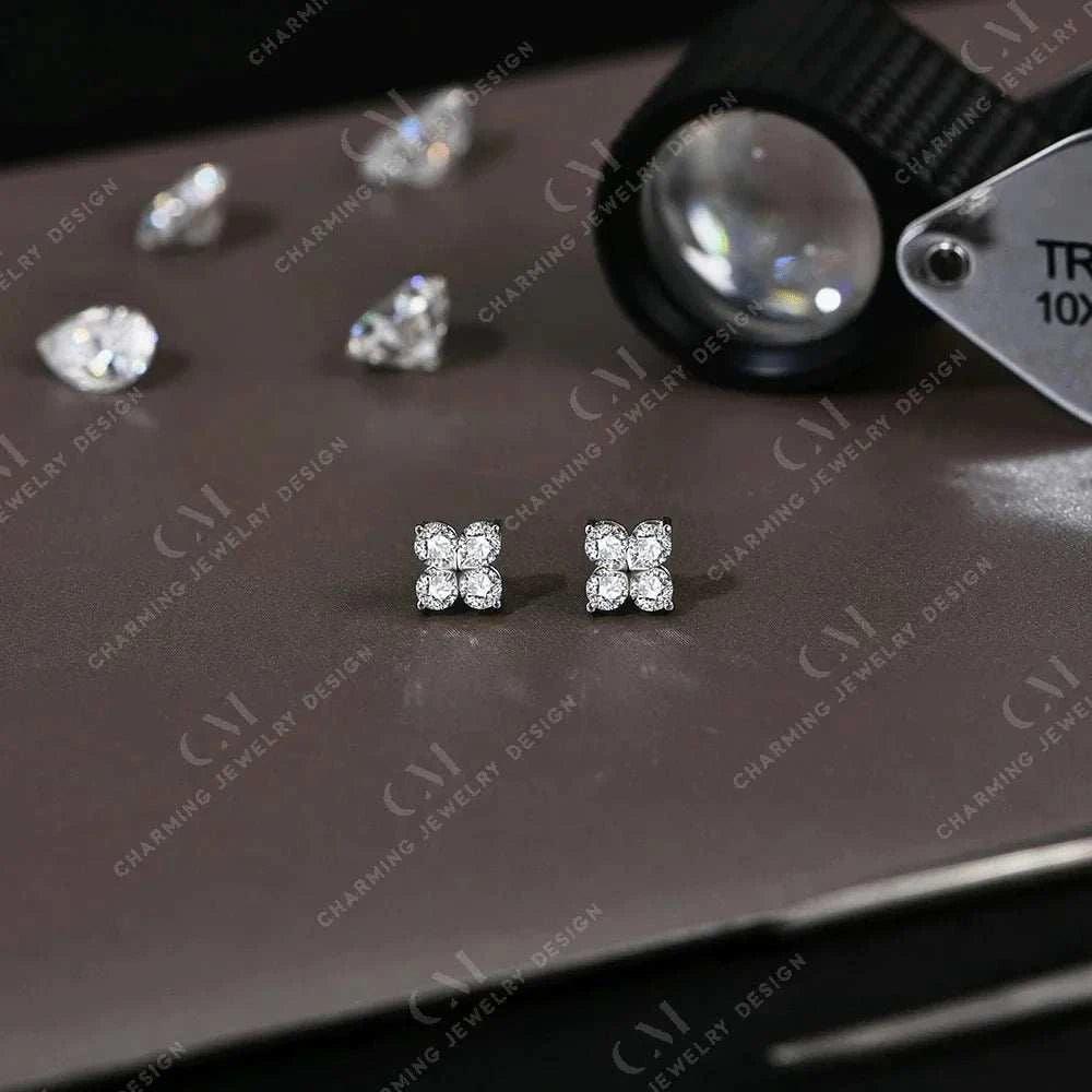 Dazzling moissanite flower earrings in gold or silver, featuring VVS1 D color Moissanite diamonds with a four-leaf clover design.