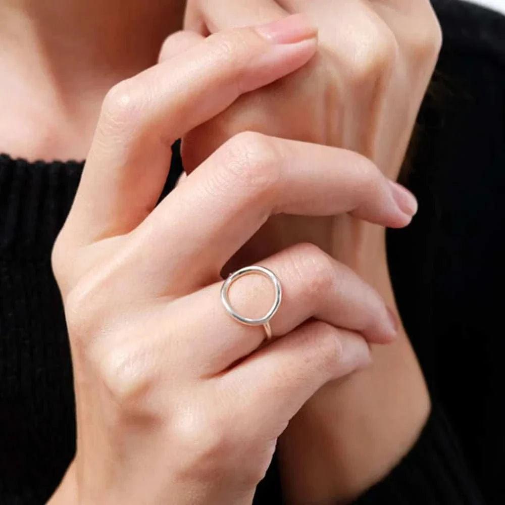 The Dainty Vintage Geometric Pinky Ring is a timeless and elegant piece that will add a touch of sophistication to any outfit. Its intricate geometric design is deli