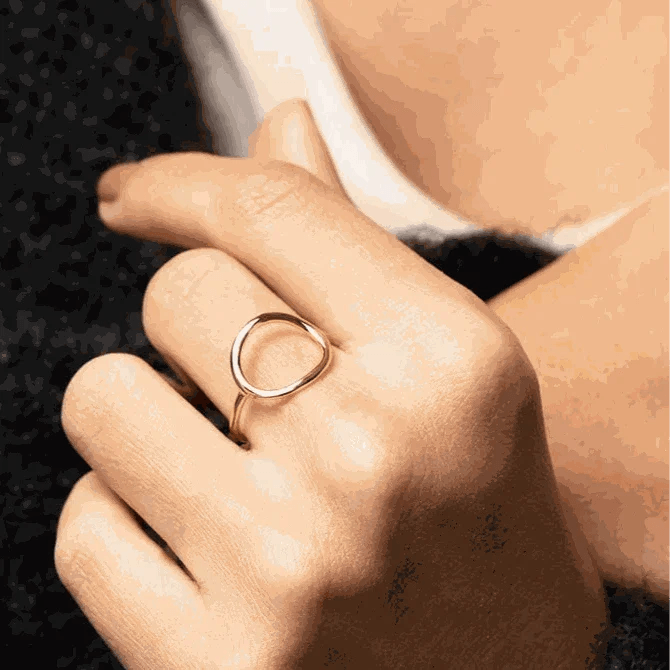 The Dainty Vintage Geometric Pinky Ring is a timeless and elegant piece that will add a touch of sophistication to any outfit. Its intricate geometric design is deli