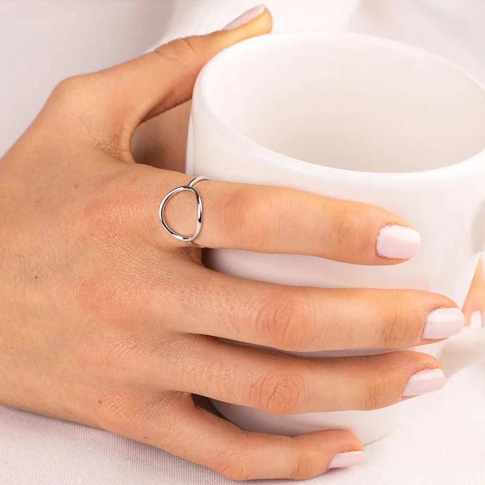 The Dainty Vintage Geometric Pinky Ring is a timeless and elegant piece that will add a touch of sophistication to any outfit. Its intricate geometric design is deli