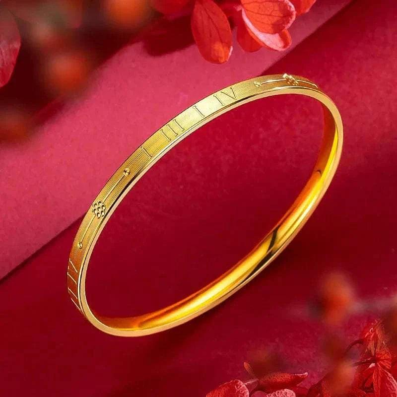 Elegant 22K Gold Women's Bracelet on Red Background
