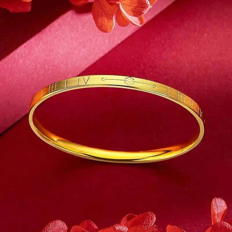 Elegant 22K gold women's bracelet on red background, perfect wedding gift.