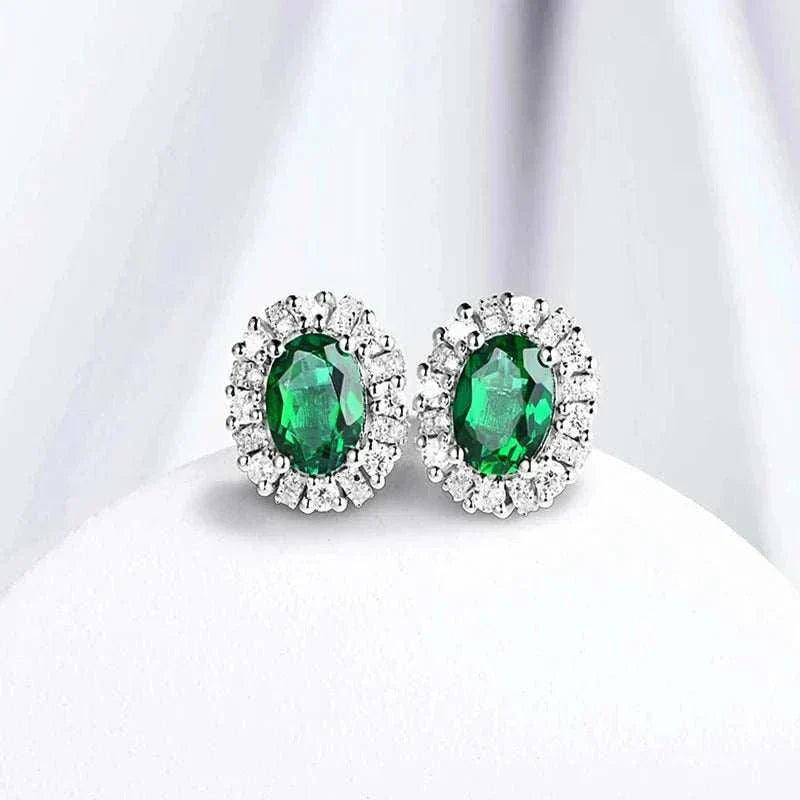 elegant 925 silver emerald stud earrings with oval-cut stones