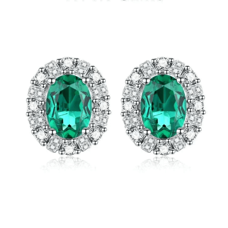 Elegant 925 silver emerald stud earrings with dazzling oval-cut stones and rhodium plating.