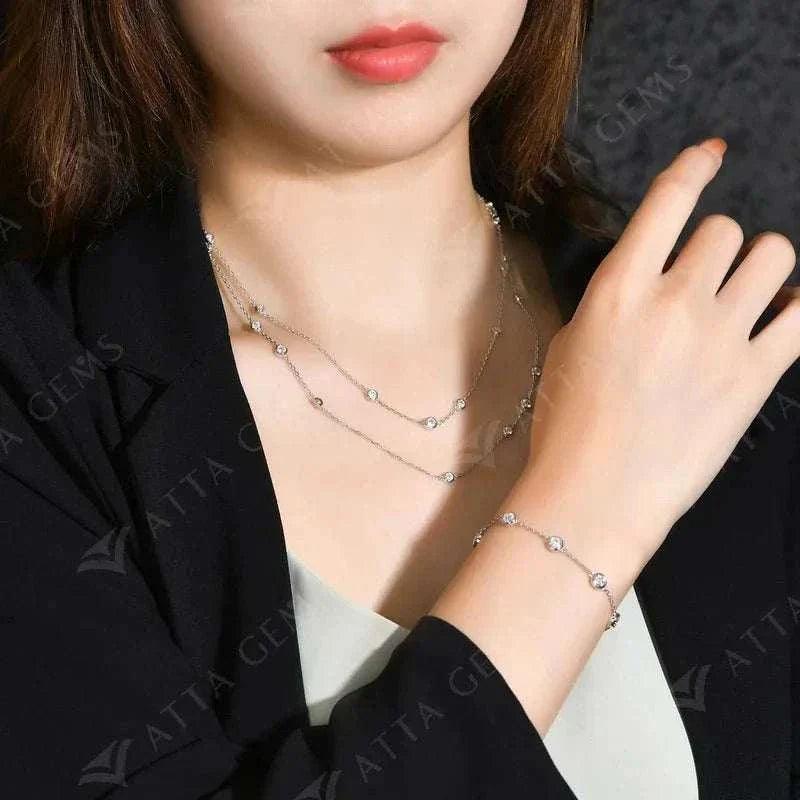 Elegant 925 silver moissanite necklace on a woman, showcasing its luxurious design and sparkling stones.