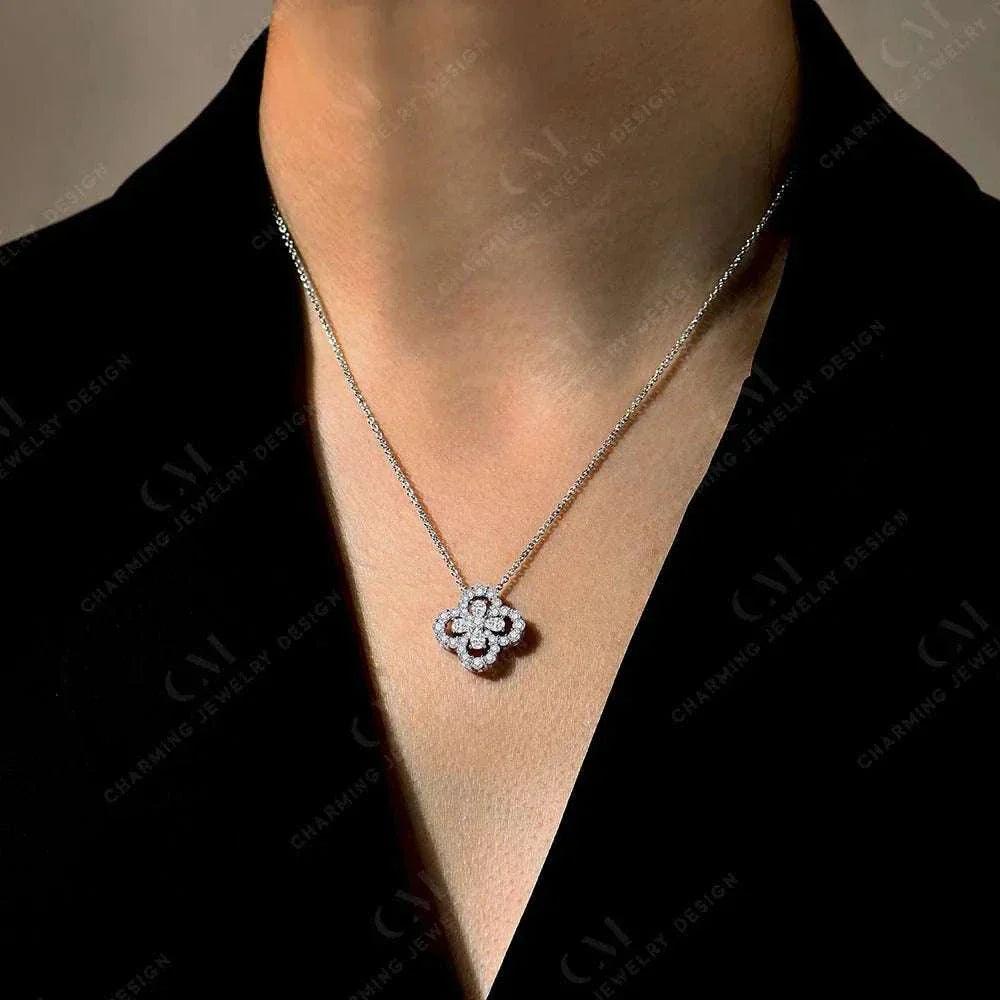 Elegant moissanite flower necklace in sterling silver.