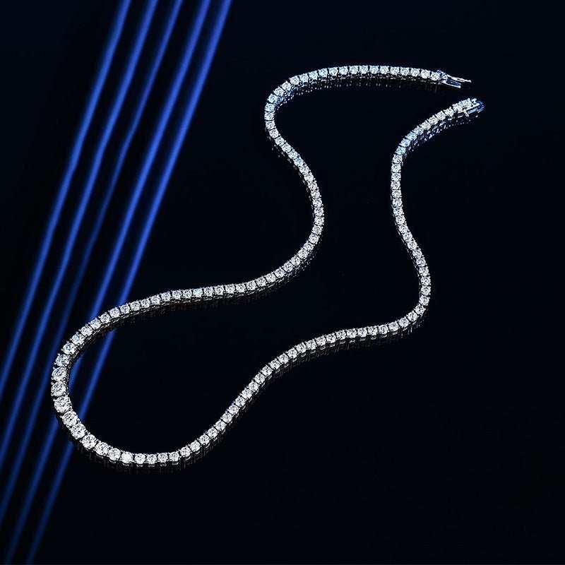 Elegant moissanite silver necklace for women on dark background showcasing sparkling stones and sleek design.