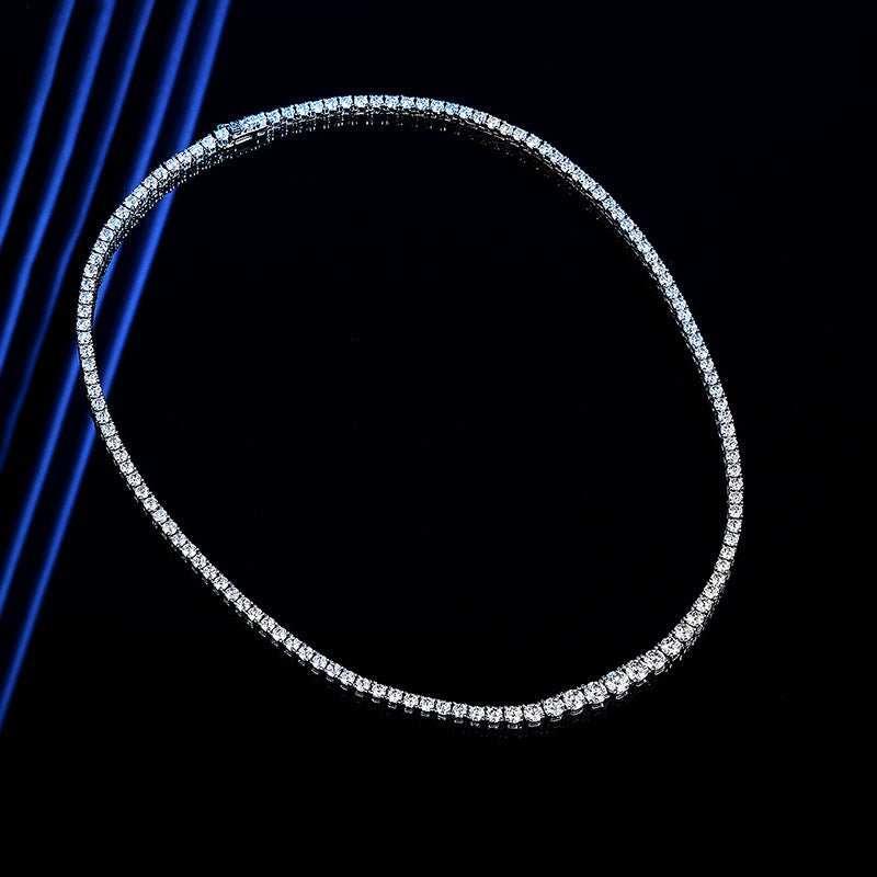 elegant moissanite silver necklace with gradient stones on black background