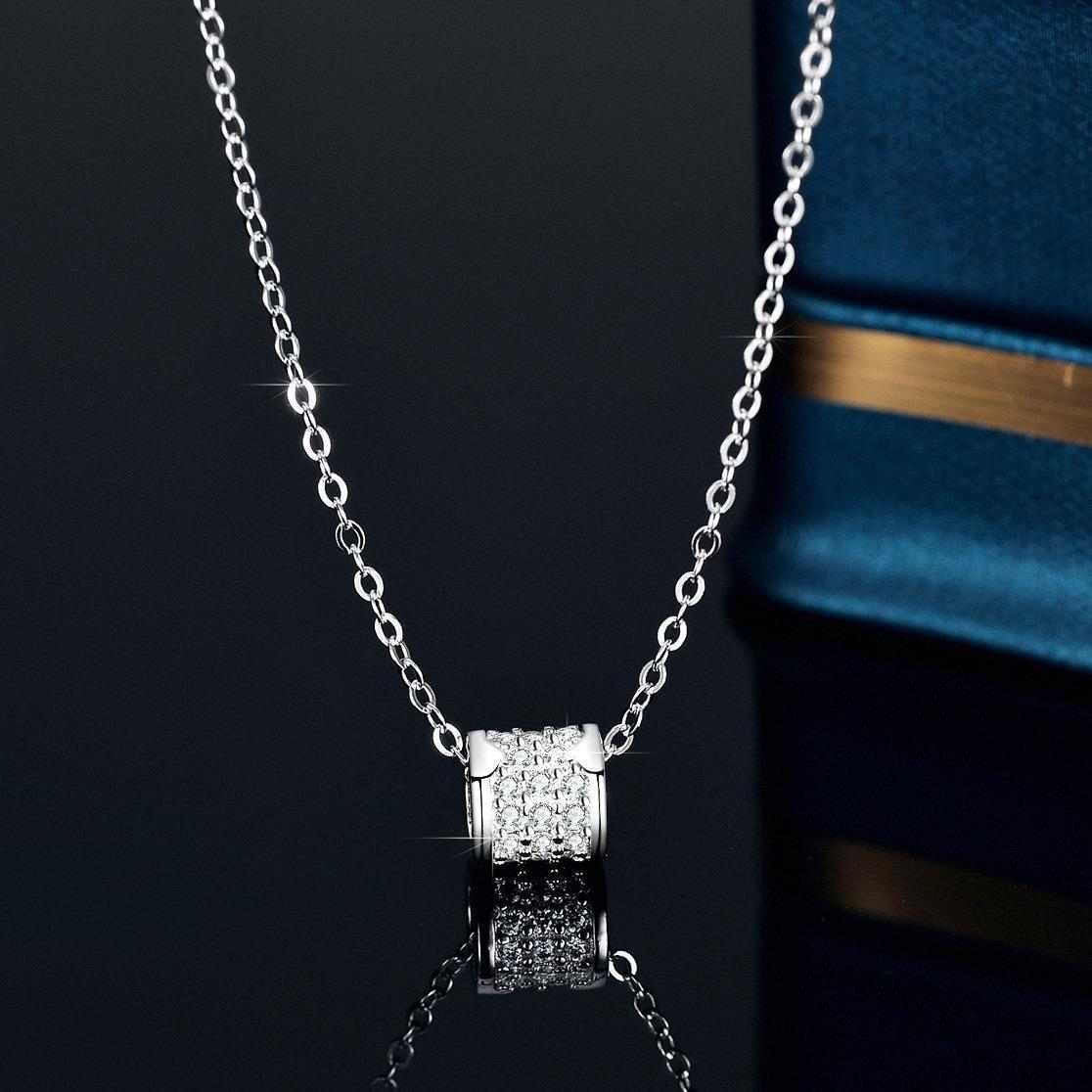 Elegant moissanite sterling silver necklace with delicate oval charm.