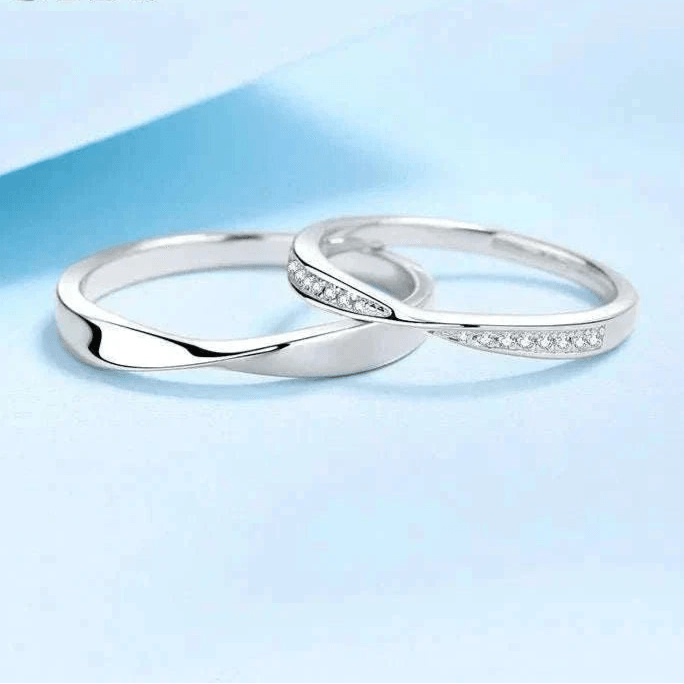 Elegant Platinum Moissanite Couples Ring Set with sleek design and sparkling moissanite stones.