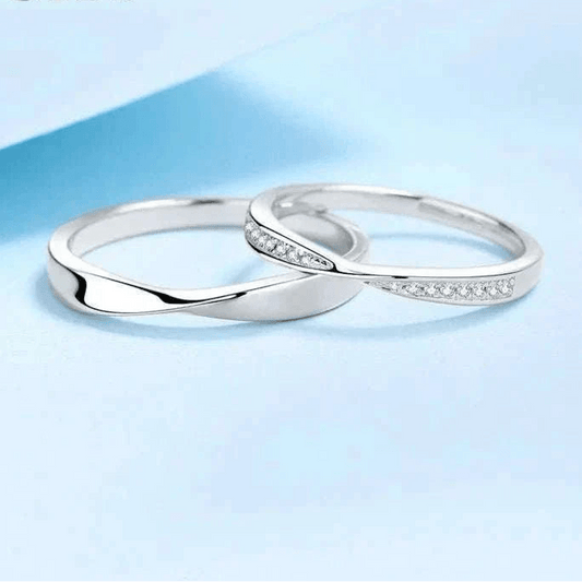 Elegant Platinum Moissanite Couples Ring Set with sleek design and sparkling moissanite stones.