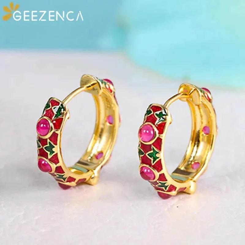 Gold plated red corundum hoop earrings with colorful enamel design.