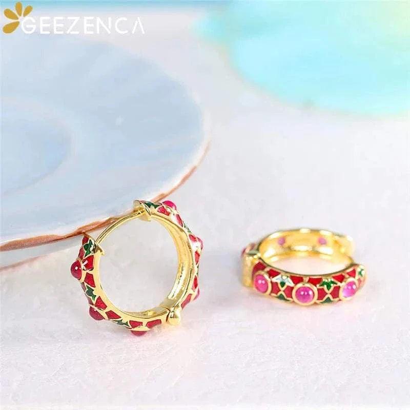 Gold plated red corundum hoop earrings with enamel detail, showcasing vibrant colors and elegance.
