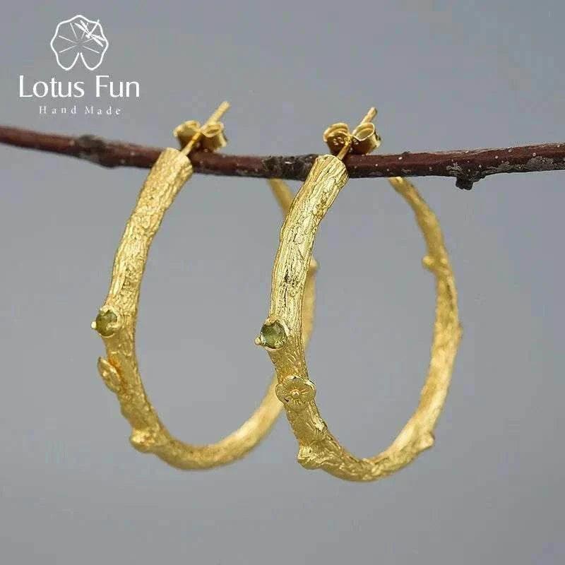 Handmade vintage peridot 925 silver hoop earrings with natural gemstones and unique design.