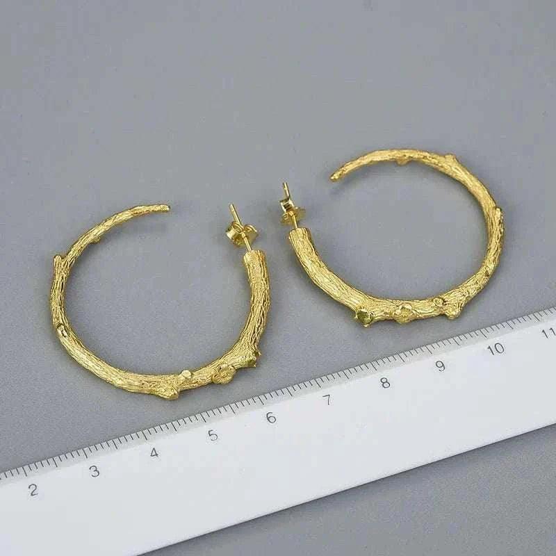 handmade vintage peridot 925 silver hoop earrings with unique design and natural gemstones