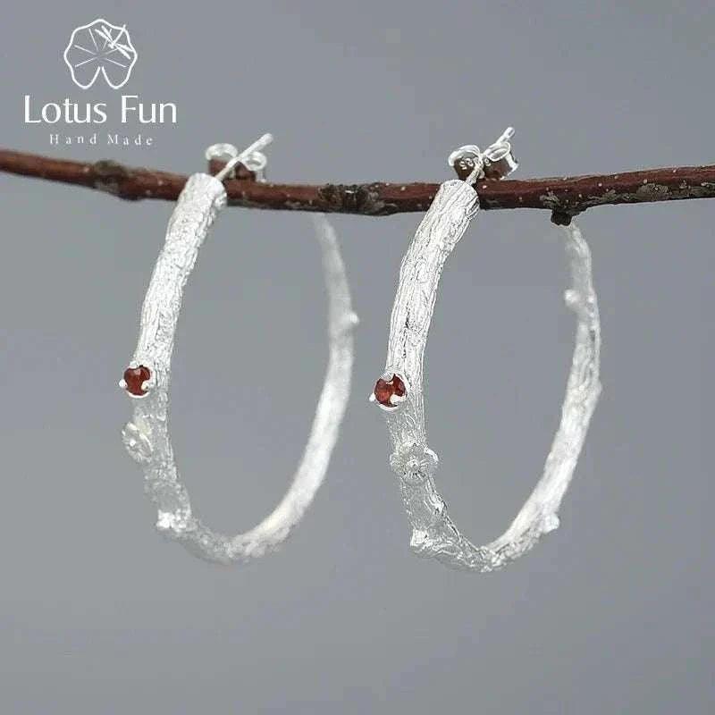 Handmade vintage peridot 925 silver hoop earrings with unique design and natural gemstones.