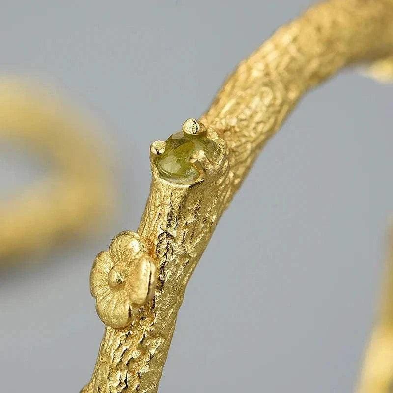 handmade vintage peridot 925 silver hoop earrings featuring textured design and peridot stones