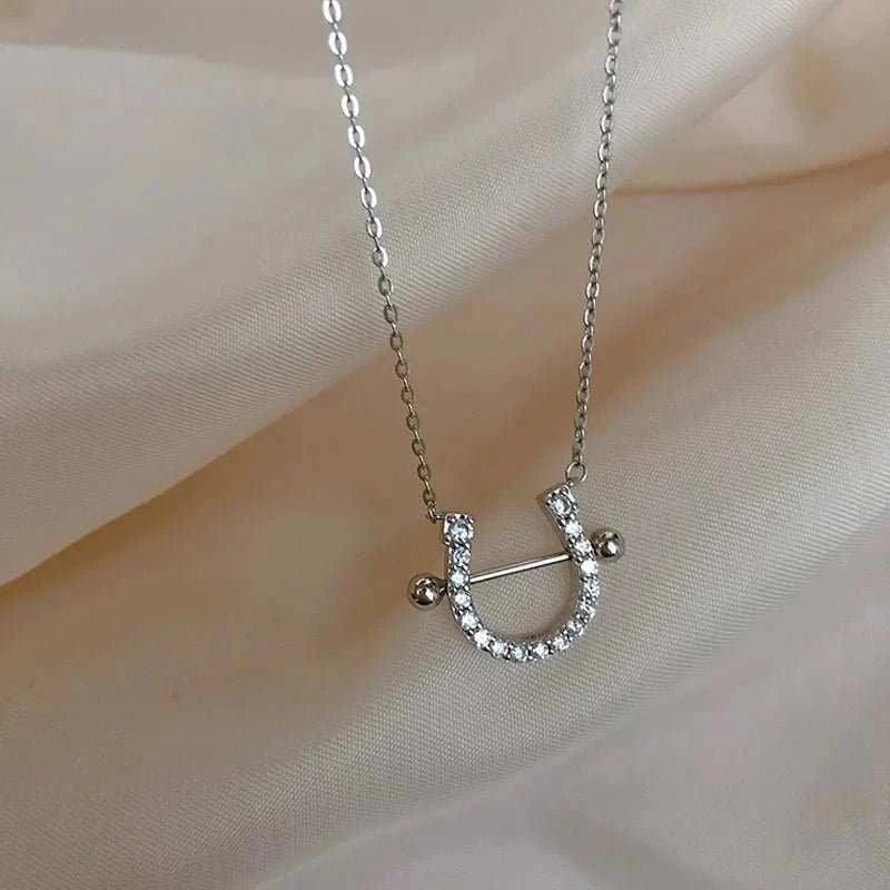 This beautiful Horseshoe Necklace and Earrings set for Women is made from high-quality materials and features a unique design that symbolizes good luck and protectio