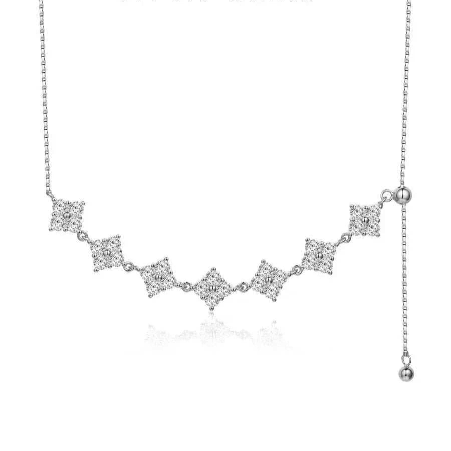 Luxury moissanite necklace in silver and gold with D color stones and VVS1 clarity.