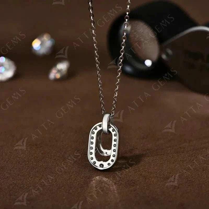 Luxury moissanite pendant necklace in silver by ATTAGEMS, showcasing a round cut moissanite gem set in 925 sterling silver.