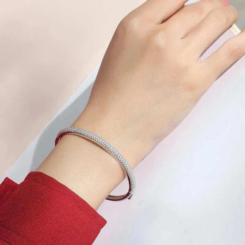 luxury s925 sterling silver moissanite cuff bracelet on woman's wrist