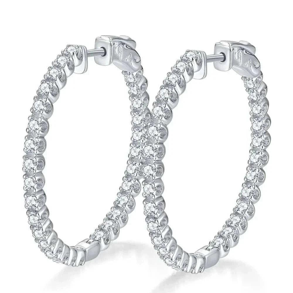 Luxury VVS Moissanite Sterling Silver Hoop Earrings with 1.56 CT stones displaying D color and VVS clarity.
