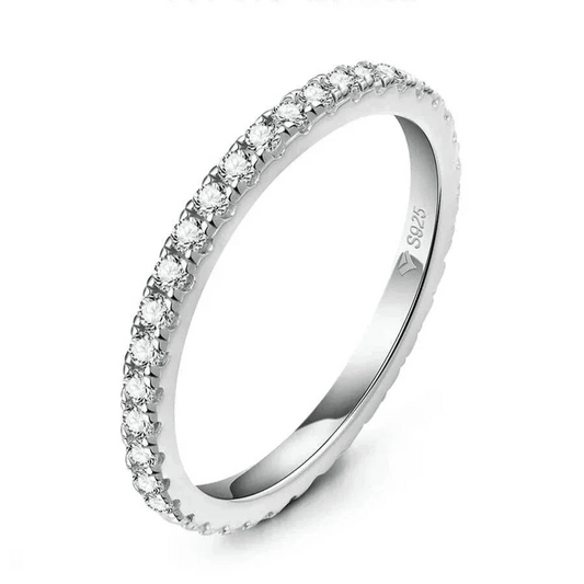Moissanite full eternity ring in sterling silver with sparkling VVS1 diamonds.
