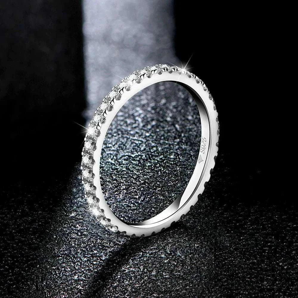 Moissanite full eternity ring in sterling silver, showcasing brilliant VVS1 D color stones.