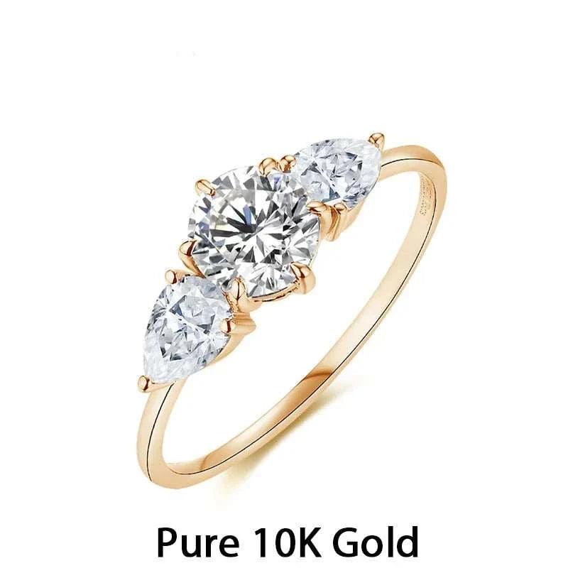 Moissanite Halo Engagement Ring in yellow gold with three sparkling stones.