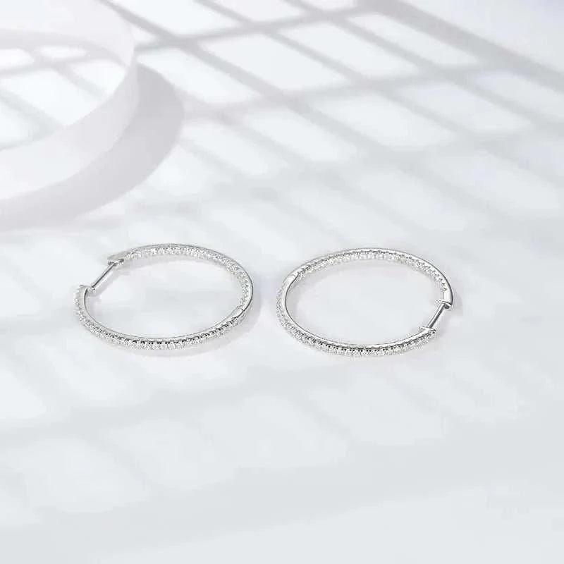 Moissanite loop earrings in 925 sterling silver with 54 moissanite stones.
