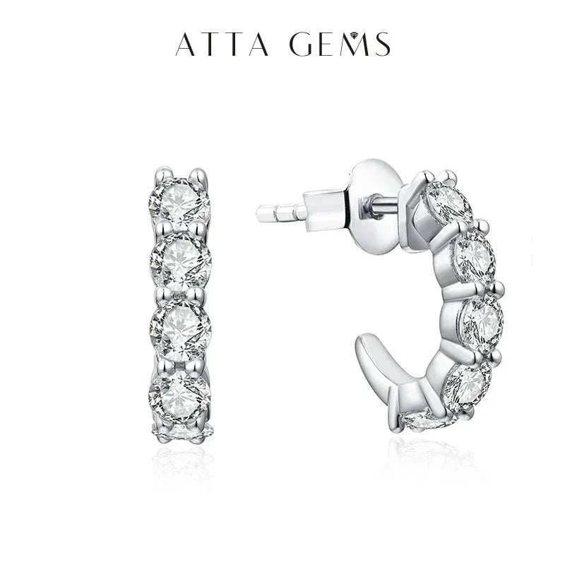 Moissanite stud earrings - elegant diamond alternative with round stones and silver setting.