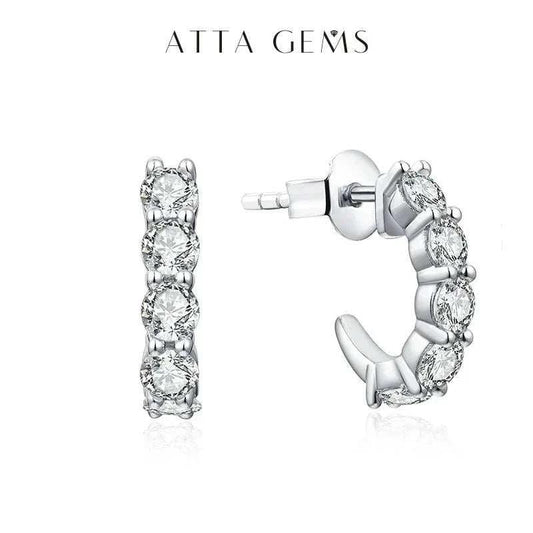 Moissanite stud earrings - elegant diamond alternative with round stones and silver setting.