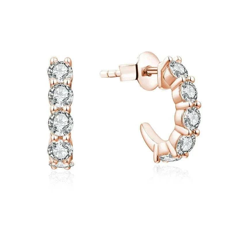 Moissanite stud earrings with yellow rose gold plating, showcasing round stones as an elegant diamond alternative.