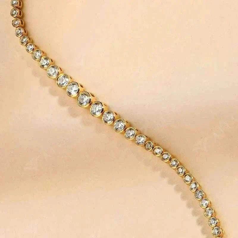 Moissanite tennis bracelet in 18k gold with dazzling stones.